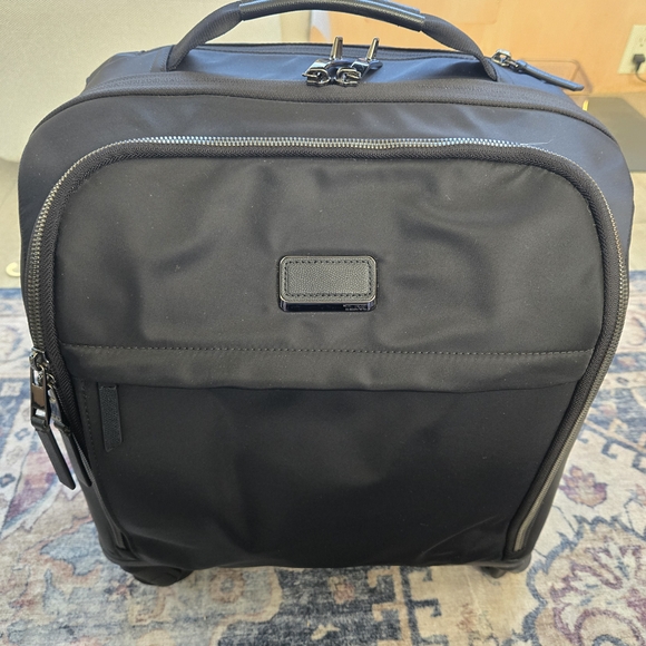 Tumi Handbags - Tumi Sleek Black Laptop Bag